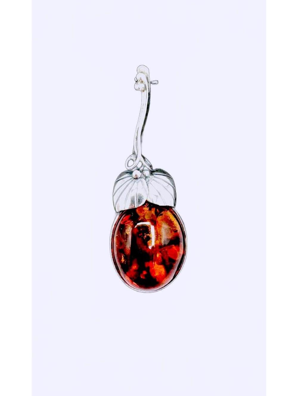 Vintage sterling silver Baltic amber cabochon in floral vine design brooch / pin